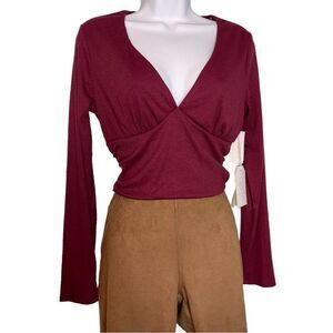 Love & Piece Cropped Top with Long Sleeves and Cut Out Back